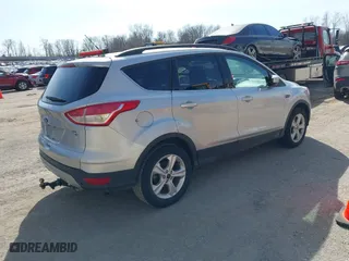 2016 Ford Escape SE with VIN 1FMCU9GXXGUA28718, listed as a IAAI auction lot 41754533 with 140,008 mi miles. Bid and sale history available at carsss.com. Image 4.