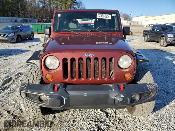 2007 Jeep Wrangler Unlimited X with VIN 1J4GB39177L124940, listed as a Copart auction lot 42505695 with 186,204 mi miles and Salvage title. Bid and sale history available at DreamBid. Image 5.
