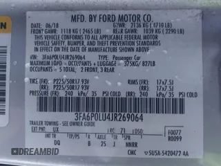 2018 Ford Fusion SE z VIN 3FA6P0LU4JR269064, wystawiony jako IAAI lot #41222967 z przebiegiem 115 077 mil mil oraz . Historia ofert i sprzedaży dostępna na DreamBid. Obrazek 9.