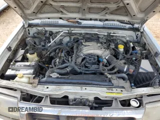 2000 Nissan Frontier XE with VIN 1N6ED27T8YC306716, listed as a Copart auction lot 55676965 with Not provided miles and Salvage title. Bid and sale history available at DreamBid. Image 11.