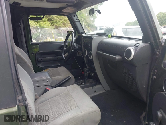 2008 Jeep Wrangler Sahara with VIN 1J4FA54178L647426, listed as a IAAI auction lot 42496322 with 157,016 mi miles and . Bid and sale history available at DreamBid. Image 5.