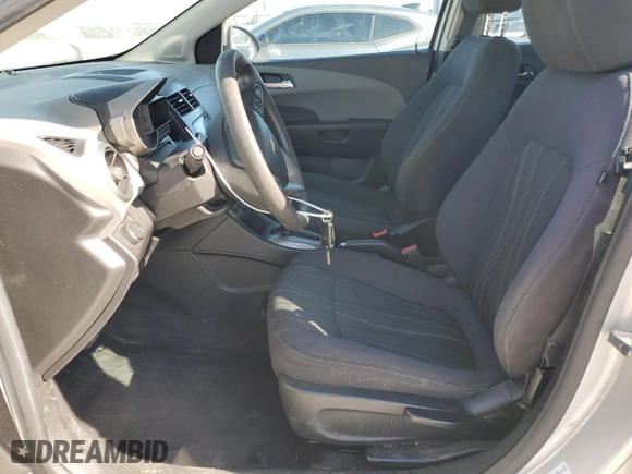 2014 Chevrolet Sonic LT with VIN 1G1JC6SH0E4213296, listed as a Copart auction lot 52858575 with 106,050 mi miles and Clean Title. Bid and sale history available at carsss.com. Image 7.
