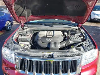 2012 Jeep Grand Cherokee Laredo with VIN 1C4RJFAG3CC163764, listed as a IAAI auction lot 41719137 with 198,827 mi miles. Bid and sale history available at carsss.com. Image 10.