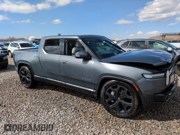 2025 Rivian R1T Adventure z VIN 7FCTGBAA6SN035587, wystawiony jako Copart lot #49142625 z przebiegiem Nie podano mil oraz Szkody całkowita. Historia ofert i sprzedaży dostępna na DreamBid. Obrazek 4.