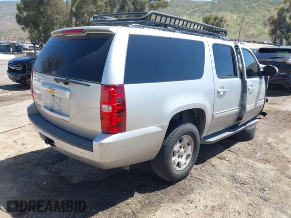 2013 Chevrolet Suburban LT with VIN 1GNSCJE06DR138925, listed as a IAAI auction lot 42008011 with 236,244 mi miles. Bid and sale history available at carsss.com. Image 4.