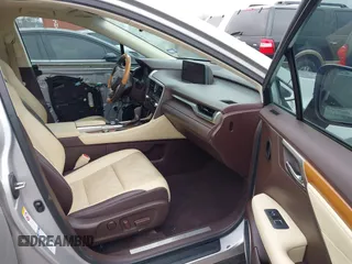 2016 Lexus RX 450h with VIN 2T2BGMCA6GC002928, listed as a IAAI auction lot 41566359 with 98,437 mi miles and . Bid and sale history available at DreamBid. Image 5.