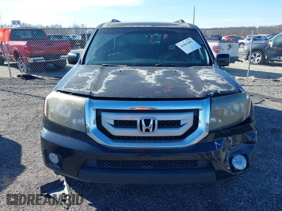 2011 Honda Pilot EX-L with VIN 5FNYF4H65BB004213, listed as a IAAI auction lot 41867681 with 157,644 mi miles and . Bid and sale history available at carsss.com. Image 12.