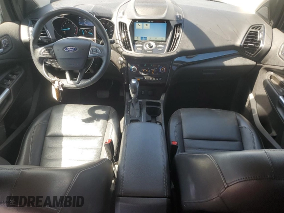 2019 Ford Escape Titanium с VIN 1FMCU9J90KUB85595, выставлен на аукционе Copart как лот 57410045 с пробегом 47 995 миль миль и Списание • Salvage title. История ставок и продаж доступна на DreamBid. Изображение 8.