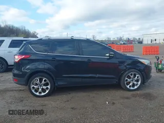 2015 Ford Escape Titanium with VIN 1FMCU9J96FUC11476, listed as a IAAI auction lot 41967914 with 149,341 mi miles. Bid and sale history available at carsss.com. Image 13.