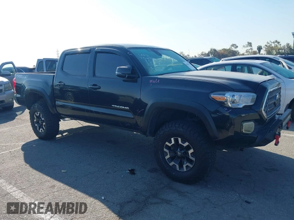 2019 Toyota Tacoma SR z VIN 5TFCZ5AN9KX199814, wystawiony jako IAAI lot #41841821 z przebiegiem 69 276 mil mil oraz . Historia ofert i sprzedaży dostępna na DreamBid. Obrazek 13.