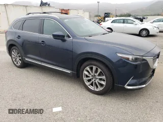 2017 Mazda CX-9 Grand Touring z VIN JM3TCADY3H0140573, wystawiony jako Copart lot #60513145 z przebiegiem 97 793 mil mil oraz Czysty tytuł • Clean title. Historia ofert i sprzedaży dostępna na DreamBid. Obrazek 4.