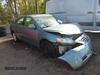 2009 Toyota Camry with VIN 4T4BE46K39R100661, listed as a IAAI auction lot 42102957 with 213,964 mi miles. Bid and sale history available at carsss.com. Image 1.