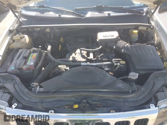 2002 Jeep Grand Cherokee Laredo with VIN 1J4GW48S22C131470, listed as a IAAI auction lot 42599375 with 200,815 mi miles and . Bid and sale history available at DreamBid. Image 10.