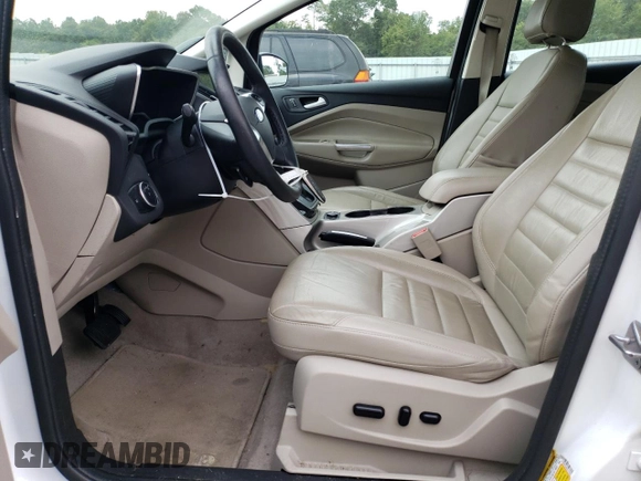 2016 Ford C-Max Energi SEL with VIN 1FADP5CUXGL117043, listed as a Copart auction lot 63949323 with 86,944 mi miles. Bid and sale history available at carsss.com. Image 7.