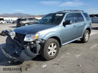 2010 Mercury Mariner with VIN 4M2CN8B77AKJ28596, listed as a Copart auction lot 87584985 with 237,298 mi miles and Salvage Title. Bid and sale history available at carsss.com. Image 1.