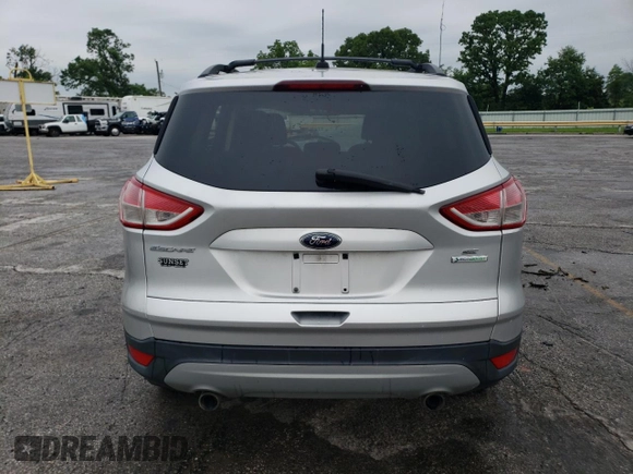 2013 Ford Escape SE with VIN 1FMCU0GX7DUB00465, listed as a Copart auction lot 58265705 with 227,613 mi miles and Salvage title. Bid and sale history available at DreamBid. Image 6.