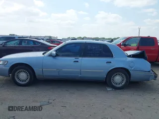 2000 Mercury Grand Marquis LS z VIN 2MEFM75W1YX673105, wystawiony jako IAAI lot #42050980 z przebiegiem 154 944 mil mil oraz . Historia ofert i sprzedaży dostępna na DreamBid. Obrazek 14.