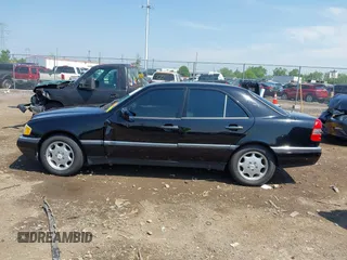 1997 Mercedes-Benz C z VIN WDBHA23E7VF501943, wystawiony jako IAAI lot #42275734 z przebiegiem Nie podano mil oraz . Historia ofert i sprzedaży dostępna na DreamBid. Obrazek 14.