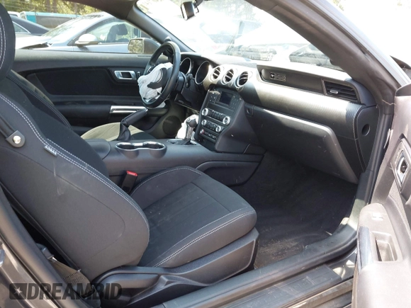 2020 Ford Mustang EcoBoost z VIN 1FA6P8TH9L5167587, wystawiony jako IAAI lot #42407141 z przebiegiem 38 757 mil mil oraz . Historia ofert i sprzedaży dostępna na DreamBid. Obrazek 5.
