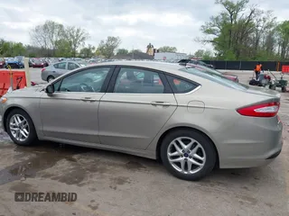 2015 Ford Fusion SE z VIN 3FA6P0H74FR127436, wystawiony jako IAAI lot #42040853 z przebiegiem 164 170 mil mil oraz . Historia ofert i sprzedaży dostępna na DreamBid. Obrazek 14.