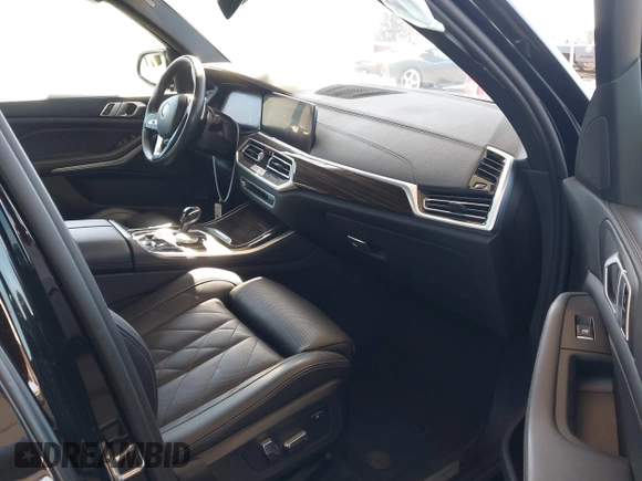 2023 BMW X5 xDrive45e z VIN 5UXTA6C01P9P71810, wystawiony jako IAAI lot #42014507 z przebiegiem 48 174 mil mil oraz . Historia ofert i sprzedaży dostępna na DreamBid. Obrazek 5.
