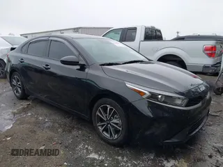 2023 Kia Forte LXS with VIN 3KPF24AD2PE574565, listed as a IAAI auction lot 41316965 with 57,592 mi miles. Bid and sale history available at carsss.com. Image 1.
