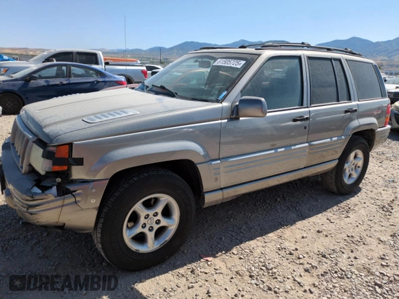 1998 Jeep Grand Cherokee Limited z VIN 1J4GZ88Z8WC306919, wystawiony jako Copart lot #61505725 z przebiegiem 195 329 mil mil oraz Czysty tytuł • Clean title. Historia ofert i sprzedaży dostępna na DreamBid. Obrazek 1.