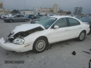 2003 Mercury Sable z VIN 1MEHM50U03G607064, wystawiony jako Copart lot #82373104 z przebiegiem 103 150 mil mil oraz Szkoda całkowita • Salvage title. Historia ofert i sprzedaży dostępna na DreamBid. Obrazek 1.