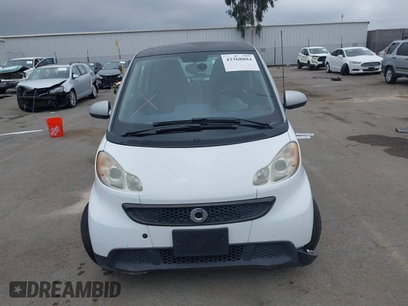 2013 Smart fortwo Pure with VIN WMEEJ3BA5DK625404, listed as a IAAI auction lot 42368884 with Not provided miles and . Bid and sale history available at DreamBid. Image 12.