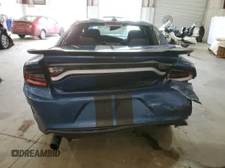 2021 Dodge Charger GT with VIN 2C3CDXHG0MH633356, listed as a Copart auction lot 53701615 with 56,638 mi miles and Salvage Title. Bid and sale history available at DreamBid. Image 6.