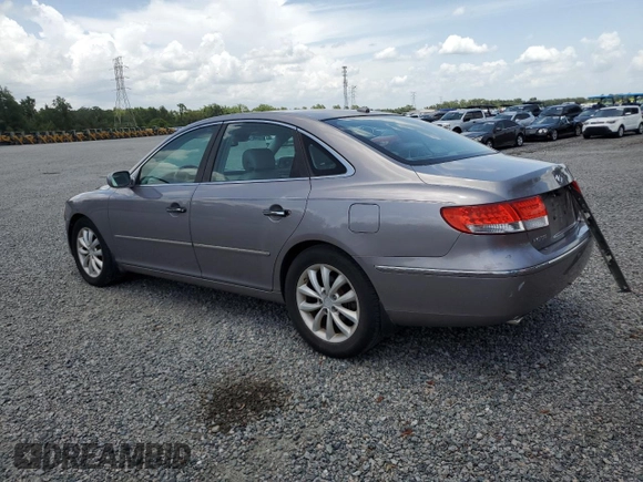 2007 Hyundai Azera SE with VIN KMHFC46FX7A216846, listed as a Copart auction lot 60035695 with 197,201 mi miles and Salvage title. Bid and sale history available at DreamBid. Image 2.