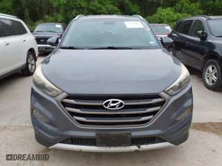 2016 Hyundai Tucson SE with VIN KM8J33A47GU128524, listed as a IAAI auction lot 42078880 with 147,227 mi miles. Bid and sale history available at carsss.com. Image 12.