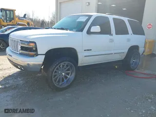 2003 Chevrolet Tahoe LS with VIN 1GNEC13Z73R126800, listed as a IAAI auction lot 41618509 with 267,234 mi miles. Bid and sale history available at carsss.com. Image 2.
