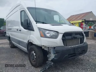 2024 Ford Transit Cargo z VIN 1FTBR3X89RKA14329, wystawiony jako IAAI lot #42483348 z przebiegiem 85 692 mil mil oraz . Historia ofert i sprzedaży dostępna na DreamBid. Obrazek 6.