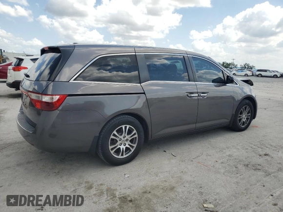 2012 Honda Odyssey EX-L with VIN 5FNRL5H65CB055196, listed as a Copart auction lot 50858245 with 115,047 mi miles and Salvage Title. Bid and sale history available at carsss.com. Image 3.