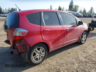 2010 Honda Fit with VIN JHMGE8H29AC008147, listed as a IAAI auction lot 42111220 with 267,843 mi miles. Bid and sale history available at carsss.com. Image 4.