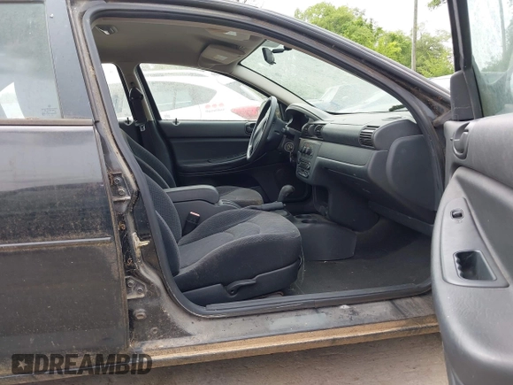 2005 Chrysler Sebring with VIN 1C3EL46X65N581673, listed as a IAAI auction lot 42204748 with 165,392 mi miles and . Bid and sale history available at DreamBid. Image 5.