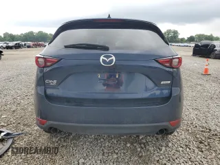 2019 Mazda CX-5 Grand Touring with VIN JM3KFBDM4K0676946, listed as a Copart auction lot 61040465 with Not provided miles and Salvage title. Bid and sale history available at DreamBid. Image 6.