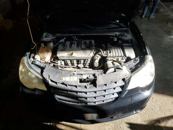 2010 Chrysler Sebring Touring with VIN 1C3CC4FBXAN112107, listed as a Copart auction lot 53942745 with 134,629 mi miles and Salvage Title. Bid and sale history available at carsss.com. Image 12.