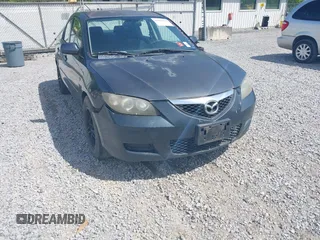 2009 Mazda 3 i Touring Value with VIN JM1BK32F291249221, listed as a IAAI auction lot 42006435 with 249,775 mi miles. Bid and sale history available at carsss.com. Image 6.