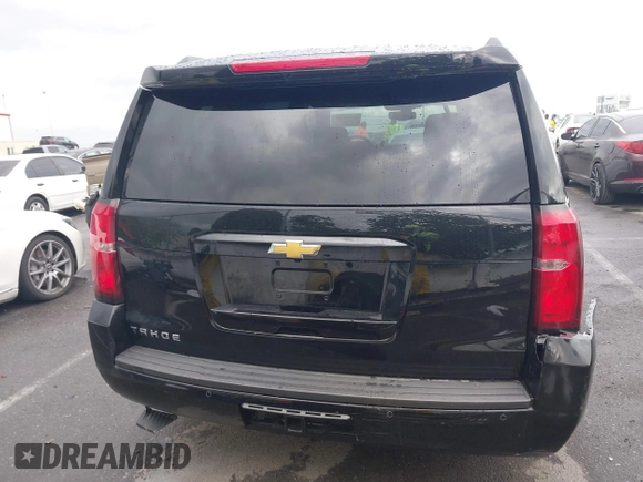 2016 Chevrolet Tahoe LS z VIN 1GNSCAEC8GR387676, wystawiony jako IAAI lot #41774142 z przebiegiem 36 695 mil mil oraz . Historia ofert i sprzedaży dostępna na DreamBid. Obrazek 17.