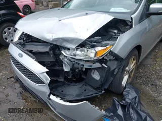 2016 Ford Focus SE z VIN 1FADP3F29GL353908, wystawiony jako IAAI lot #42289308 z przebiegiem 94 937 mil mil oraz . Historia ofert i sprzedaży dostępna na DreamBid. Obrazek 6.