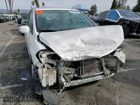 2008 Nissan Versa 1.8 S with VIN 3N1BC11E58L371074, listed as a Copart auction lot 46701965 with 49,467 mi miles and Salvage Title. Bid and sale history available at carsss.com. Image 10.