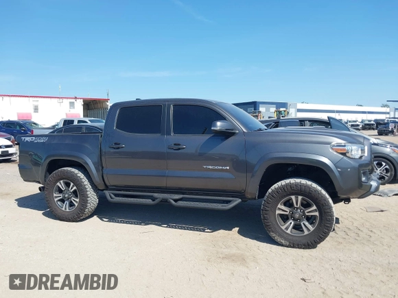 2017 Toyota Tacoma SR5 with VIN 3TMCZ5AN4HM052380, listed as a IAAI auction lot 42277918 with 62,238 mi miles and . Bid and sale history available at DreamBid. Image 14.