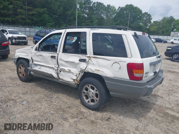 1999 Jeep Grand Cherokee Laredo with VIN 1J4GW58S3XC505985, listed as a IAAI auction lot 42399619 with 253,876 mi miles and . Bid and sale history available at DreamBid. Image 3.