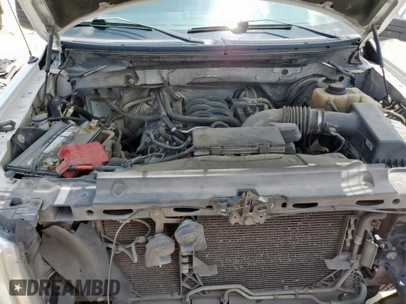 2012 Ford F-150 XL with VIN 1FTNF1CF0CKD94098, listed as a Copart auction lot 58035235 with 169,584 mi miles and Salvage title. Bid and sale history available at DreamBid. Image 11.