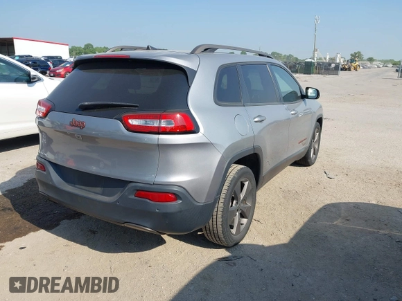 2016 Jeep Cherokee Latitude with VIN 1C4PJLCB7GW256587, listed as a IAAI auction lot 42037539 with 209,267 mi miles. Bid and sale history available at carsss.com. Image 4.