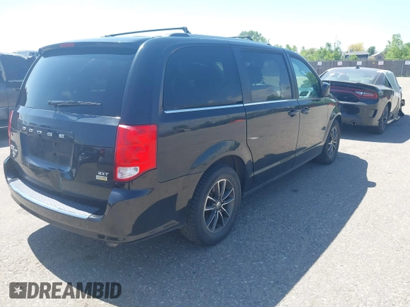 2018 Dodge Grand Caravan SXT z VIN 2C4RDGCG2JR343705, wystawiony jako IAAI lot #42324266 z przebiegiem 170 018 mil mil oraz . Historia ofert i sprzedaży dostępna na DreamBid. Obrazek 4.