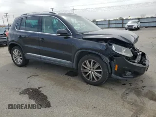 2012 Volkswagen Tiguan SE with VIN WVGAV7AX2CW535869, listed as a Copart auction lot 50589445 with 114,978 mi miles and Salvage Title. Bid and sale history available at DreamBid. Image 4.