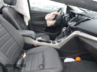 2013 Ford Escape SEL with VIN 1FMCU9H92DUA90495, listed as a IAAI auction lot 41780306 with 139,979 mi miles. Bid and sale history available at carsss.com. Image 5.